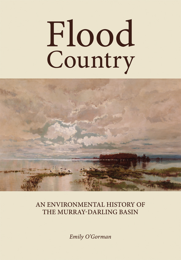 The cover image of Flood Country, featuring a vista of a cloudy sky reflected in flooded plains.