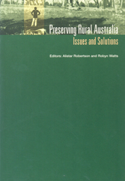 The cover image featuring a thin strip, green tinted, image across the top of the cover of a man with his hands on his hips in cleared land, with tree