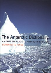 The cover image of The Antarctic Dictionary, featuring a white  Antarctic view, with two tall icebergs sticking out of ice covered water, with blue sk
