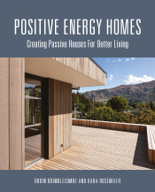 Cover of featuring exterior photograph of wooden home with mountains in ba