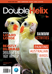 Cover of magazine with two birds and texts.