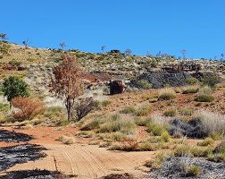 Photograph of waste rock dumps and former mine infrastructure at Mount Cobalt, Queensland.