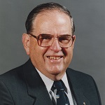 A portrait photograph of Dr William (Bill) Roderick Blevin.