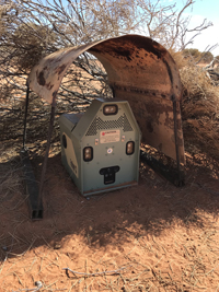 A Felixer grooming trap under shade shelter used in the trial.